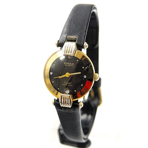 Vintage OMAX Crystal Watch Gold two tone Black dial Dress Watch - Fashion Designer - Japan made - original - running - 1980 &#39;s