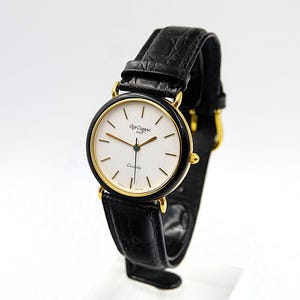 Montre tendance GUY CLARAC PARIS plaquée or avec lunette en émail noir - originale - créateur de mode français - en cours d'exécution