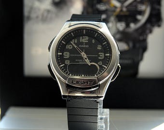 Beautiful CASIO ILLUMINATOR World Time Ana-Digi Alarm Chronograph Unisex Watch Ref.  AQ-180W 3793 Digital Quartz Watch
