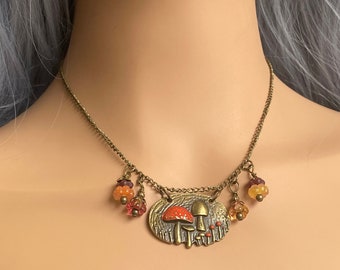 Brass mushroom patch pendant with glass flowers  hippie jewelry mushroom necklace