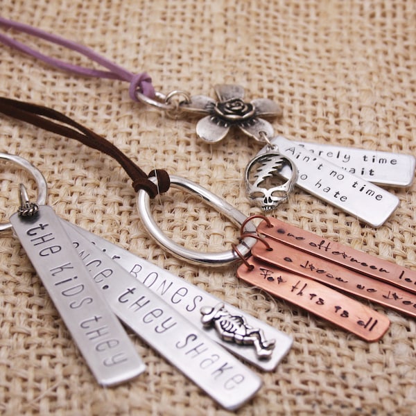 Grateful Lyrics / hand-stamped hippie jewelry / Dead lyrics / The kids they dance / Ain't no time to hate / For this is all a dream /