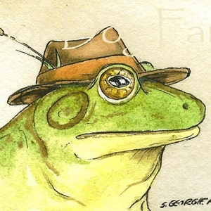 May include: A watercolor painting of a green frog wearing a brown fedora with an orange band. The frog has a large, round, yellow eye and a small, black eye. The frog is looking to the right.