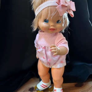 1982 Mattel “Baby Skates” Baby Doll Wind Up Rollerskating Action. She moves but veeeeeerrryy sloooowly. She is missing one wheel. Read below