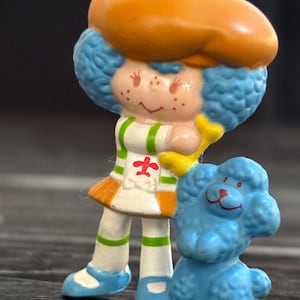 1982 Crepe Suzette with Poodle Eclair. American Greetings 1.5” PVC mini figure.