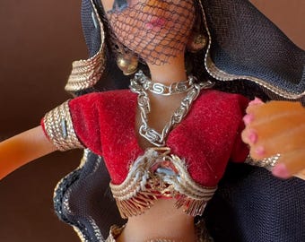 1950s Flagg & Company 7” vinyl, poseable, handpainted international doll. Arabian dancer. See pics.