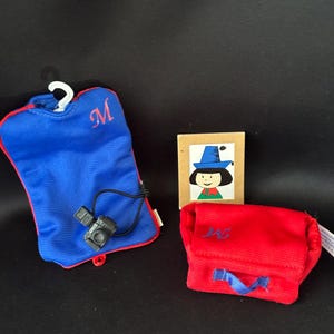 1997 Madeline Travel Accessories Set #33446 by Eden Toys.  Accessories as pictured: Suitcase, travel bag, picture frame and camera.