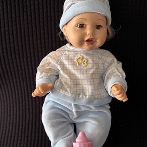 1995 Playmates “Baby So Beautiful” Newborn Baby Boy 12” Doll Ash Blonde hair. BSB tagged diaper, hat, 2-piece pjs, wristband & bottle.