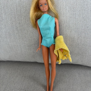 Sunset Malibu Barbie doll #1070. Vintage 1970 with original swimsuit/towel. Made in Korea. Nice doll with some issues. See pics and details