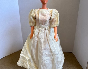 Barbie clone crepe (?) wedding dress with puff 3/4 sleeves in Cream/Ivory. Untagged. (Doll not included.)