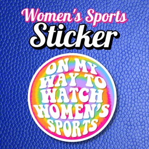 May include: A round sticker with a tie-dye background and the text "On My Way To Watch Women's Sports" in white letters.