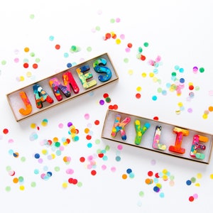 Personalized crayons for kids. Custom rainbow crayon name set in a ready-to-ship gift box by crayon shop Art2theExtreme.