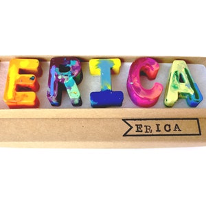 Crayon name set by Art2theExtreme that spells the name ERICA in rainbow crayon letters. This personalized gift for kid is a great party favor for kid idea or stocking stuffer for a girl or boy.
