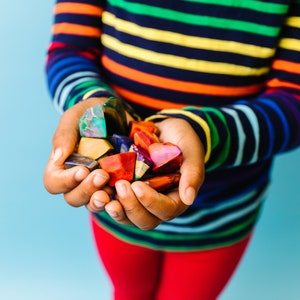 Rainbow crayon rocks by crayon shop Art2theExtreme are easy to hold and features an array of bright colors, which blend together in endless combinations as you create your masterpiece.