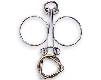 Lion's Lair Wire Puzzle from Puzzle Master is a metal brain teaser, mechanical puzzle brain game, IQ test mind game puzzle for kids & adults