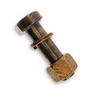 May include: A brass bolt with a hexagonal head and a threaded shaft. The bolt has a decorative ring around the shaft.