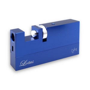 May include: A blue metal puzzle lock with the word "Lotus" engraved on the side. The lock has a silver metal pin and a silver metal roller.
