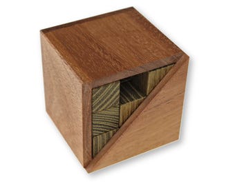 The Triangle Cube 3 Wood Puzzle from Pelikan Puzzles is wooden IQ Logic Puzzle, Brain Teaser, Puzzle Master, Burr Puzzle