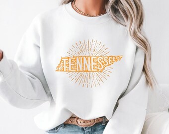 Felpa girocollo da donna del Tennessee / Bianca e arancione / Grafica dello stato in arancione TN