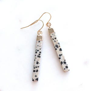Slender Jasper stone bars dangle from natural brass ear wires. These simple, minimalist style earrings are perfect for everyday wear at work or out for the evening. the stone part measures about an inch and a half long.