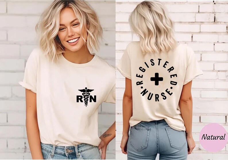 May include: A beige t-shirt with a black medical symbol and the letters "RN" on the front. The back of the shirt has the text "REGISTERED NURSE" in a circle with a black cross in the center.