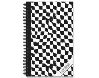 Spiraalvormig notitieboekje: zwart-witte blokken