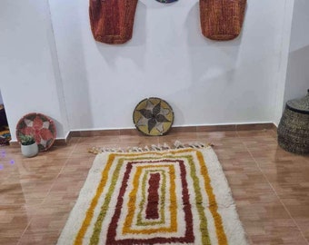 Ambachtelijke uitmuntendheid: handgemaakte Marokkaanse tapijten door bekwame Berberse ambachtslieden