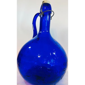 Vtg Italy Cobalt Blue Glass Whiskey Jug decanter Handle Embossed Fish Birds Pond