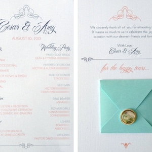 May include: Wedding invitation with a light blue envelope and a wax seal. The invitation features a calligraphy script with the names "Cesar & Amy" and the date "August 10, 2013". The invitation lists the ceremony and reception details, including the names of the wedding party.