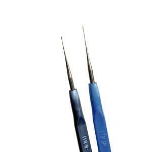 May include: Two crochet hooks with metal tips and colored handles. One hook has a dark blue handle, and the other has a blue handle. The handles have the brand name "TULIP" printed on them.