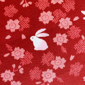 Rabbits and Cherry Blossoms Japanese cotton fabric 3060-27E red