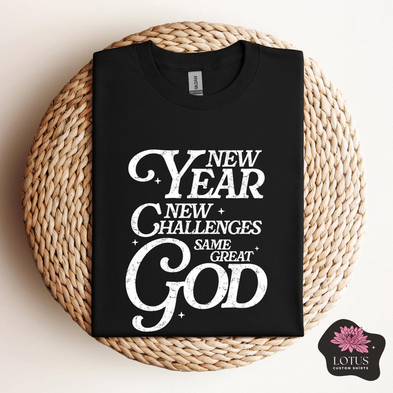 May include: Black t-shirt with white text that reads "New Year New Challenges Same Great God".