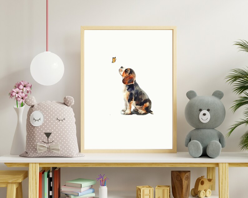 May include: A watercolour painting of a beagle puppy looking up at a butterfly. The puppy is brown, black, and white and is sitting on a white background.