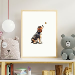May include: A watercolour painting of a brown and black beagle puppy looking up at a yellow butterfly. The puppy is sitting on a white background.
