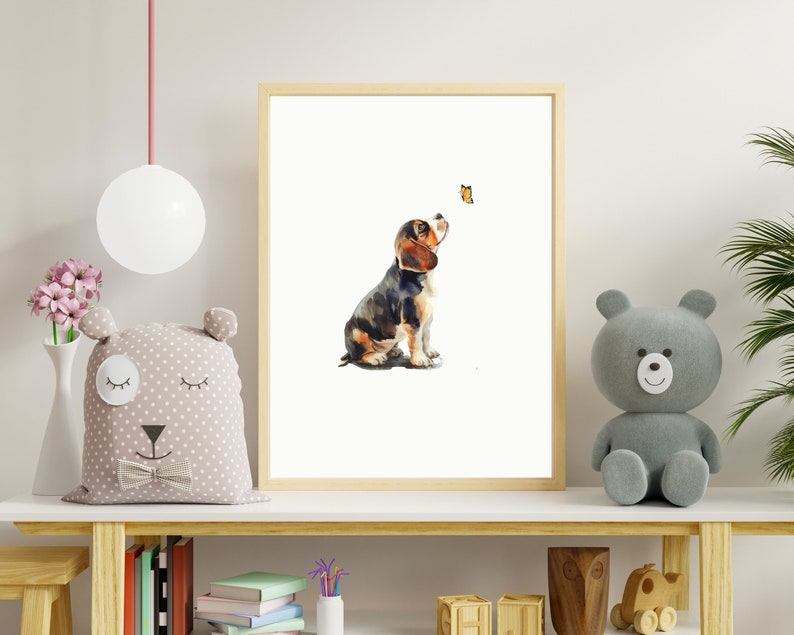May include: A watercolour painting of a brown and black beagle puppy looking up at a yellow butterfly. The puppy is sitting on a white background.