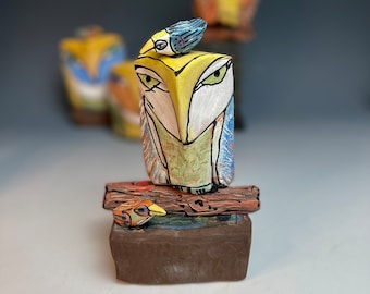 Owl art, figurine, ceramic owl sculpture, whimsical, colorful owl,"Owl Person and Beauty Birds in the Sacred Forest"