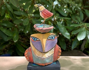 Owl sculpture handmade from clay with unique, colorful glazes makes a heartfelt gift"Owl Person and the Dancing Red Bird Dreaming Love"
