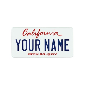 May include: A white rectangular sticker designed to look like a California number plate. The word "California" is in red script above bold blue text that reads "YOUR NAME." Below, in smaller red text, is "dmv.ca.gov."