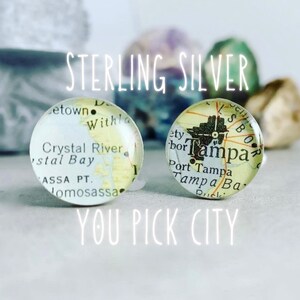 May include: Sterling silver cufflinks featuring a map of Tampa, Florida and Crystal River, Florida.  You pick city.