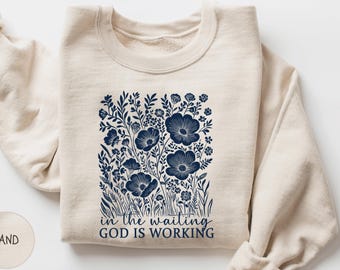 In The Waiting God Is Working Sweatshirt, Christian Faith Crewneck Pullover, Bible Verse Floral Sweater, Religious Inspirational Jumper Gift