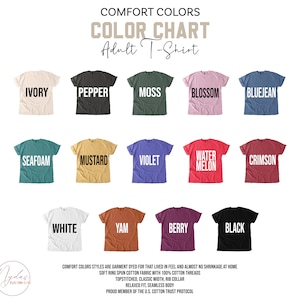 May include: Color chart for adult t-shirts with 18 different color options. The colors are displayed on t-shirts with the color name printed in white on each shirt. The chart includes colors like Ivory, Pepper, Moss, Blossom, Bluejean, Seafoam, Mustard, Violet, Water Melon, Crimson, White, Yam, Berry, and Black.
