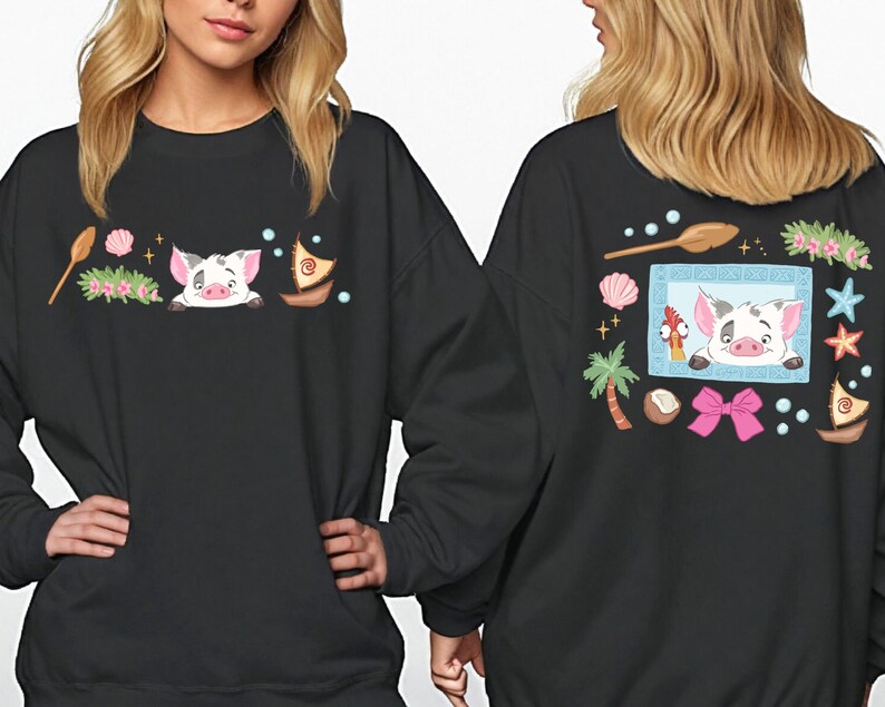 two people wearing black sweatshirts with colorful illustrations of pigs and various objects, such as a boat, palm tree, starfish, and a bow.