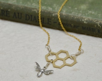 Brass and sterling honeycomb bee necklace. Honeybees, bee-themed, bee jewelry, bee necklace