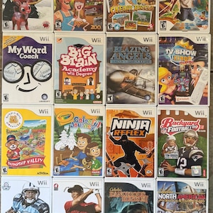 May include: A collection of Wii video game cases. Titles include "Rudolph," "Calvin Tucker's Redneck Jamboree," "Go Diego Go! Safari Rescue," and "Outdoor Challenge." Other games are "My Word Coach," "Big Brain Academy," and "Blazing Angels."
