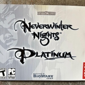 May include: Neverwinter Nights Platinum PC game box. The cover features the game title in stylized black script over a silver background with a graphic of a face. The Atari logo is in a red box on the lower right.