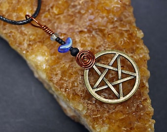 Pentagram necklace with bronze and copper hand made in Michigan. A perfect necklace to show that you honor the Earth and all Her inhabitants