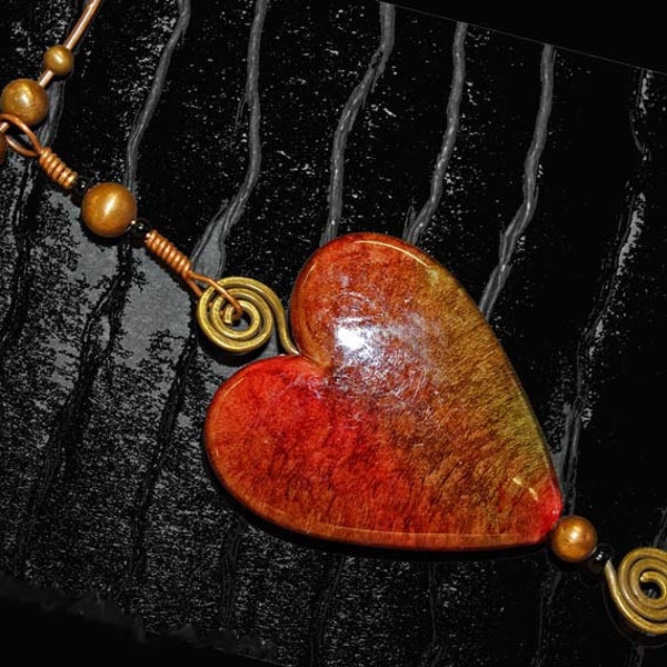 Red glazed ceramic heart necklace in copper.