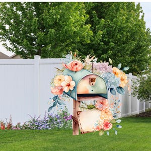 May include: A blue and green mailbox with a floral arrangement of pink, yellow, and blue flowers. The mailbox is decorated in a watercolour style and is sitting on a wooden post.