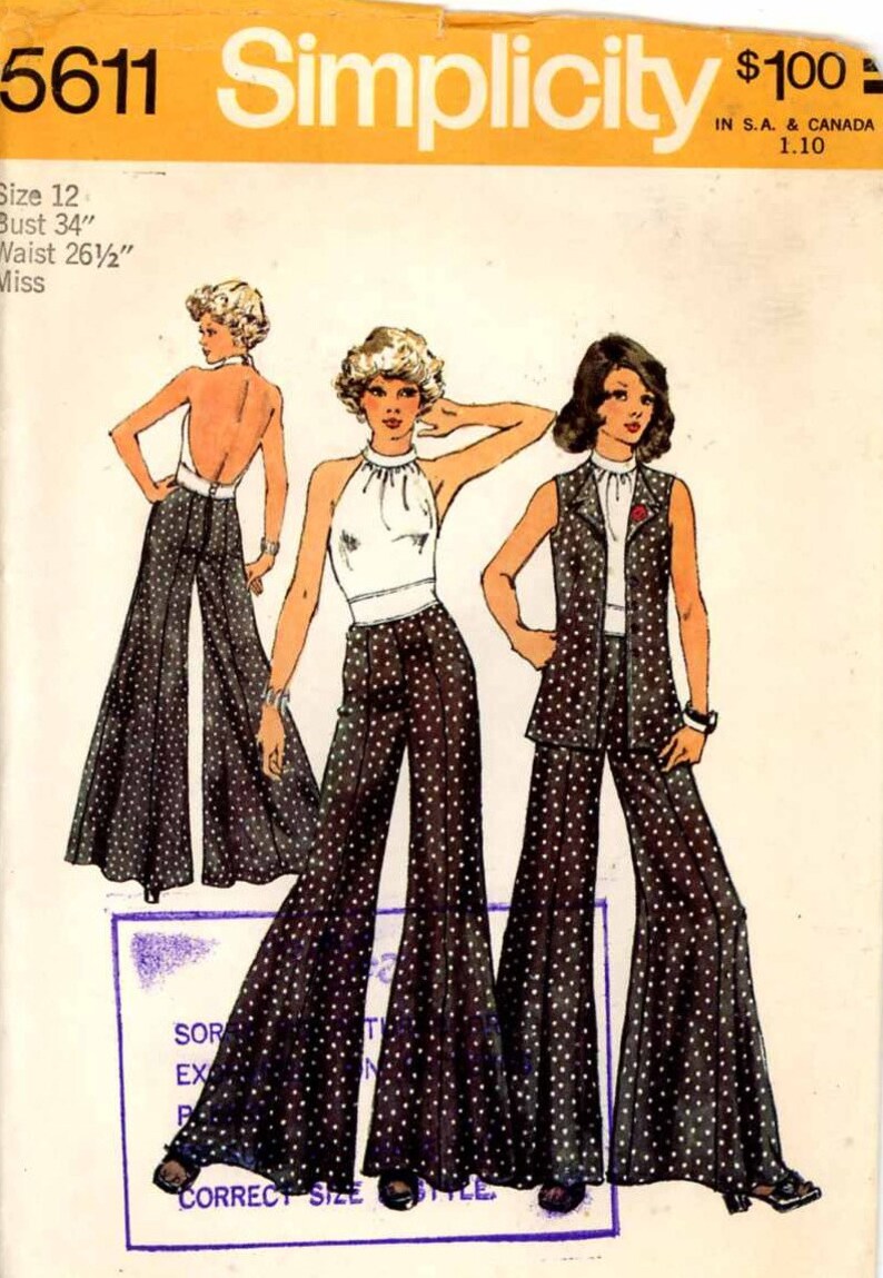 May include: A vintage sewing pattern for a women's pantsuit with a halter top and a vest. The pattern is for size 12, bust 34 inches, and waist 26 1/2 inches. The pattern is from Simplicity and is number 5611.