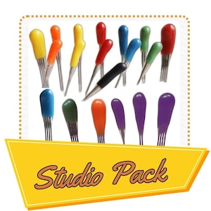 May include: A set of 18 colorful embroidery needles with different colored handles. The needles are arranged in a studio pack.