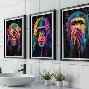 May include: Three colorful monkey illustrations, each covering a different part of their face. The monkey on the left is covering its eyes, the monkey in the middle is covering its ears, and the monkey on the right is covering its mouth. The monkeys are painted in a vibrant rainbow of colors.